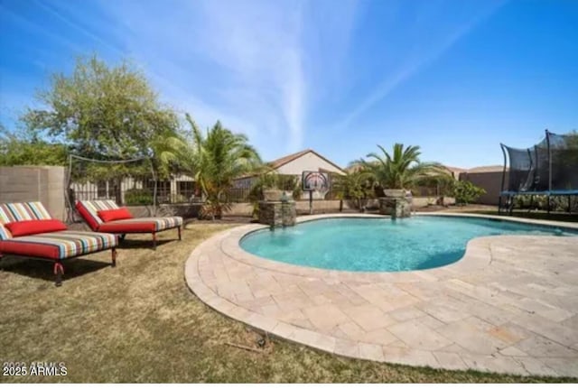 514 E Pearce Rd, Phoenix, AZ 85042 - view of swimming pool with a trampoline, a fenced backyard, and a patio area