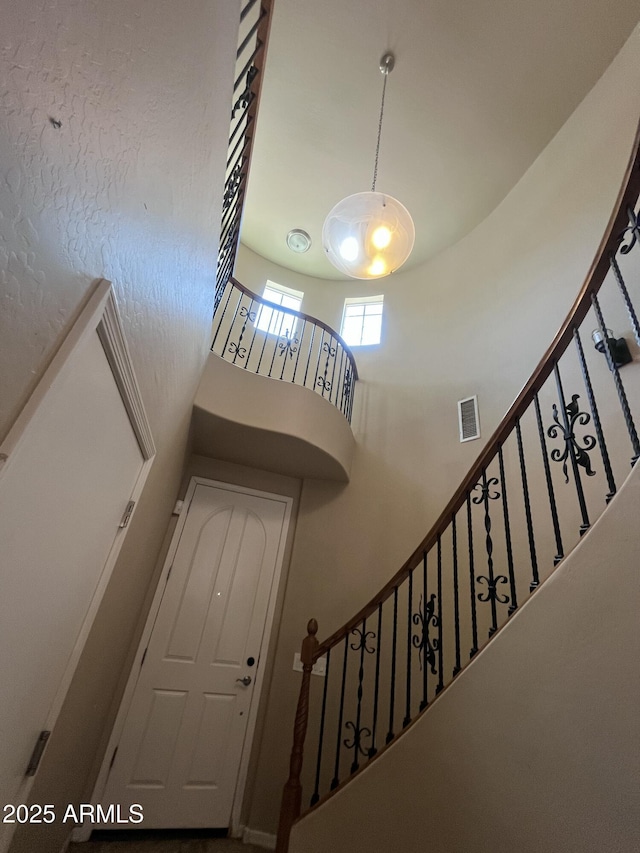 514 E Pearce Rd, Phoenix, AZ 85042 - staircase with a towering ceiling