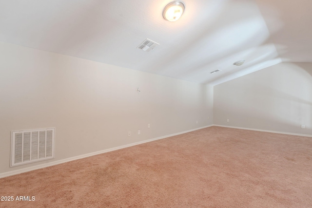 514 E Pearce Rd, Phoenix, AZ 85042 - carpeted empty room featuring vaulted ceiling and baseboards