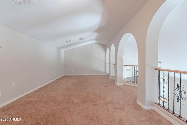 514 E Pearce Rd, Phoenix, AZ 85042 - unfurnished room with carpet floors, lofted ceiling, and baseboards