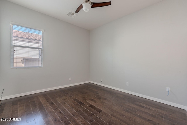 514 E Pearce Rd, Phoenix, AZ 85042 - unfurnished room featuring dark wood-style flooring, baseboards, and ceiling fan