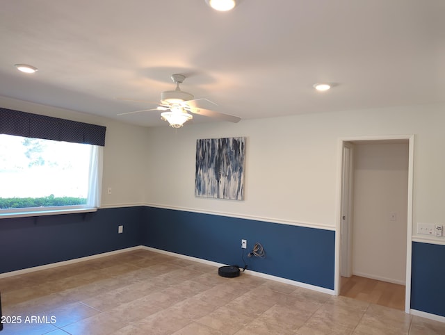 unfurnished room with a ceiling fan, recessed lighting, and baseboards