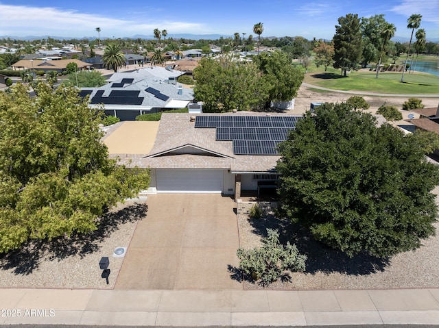 birds eye view of property with a residential view