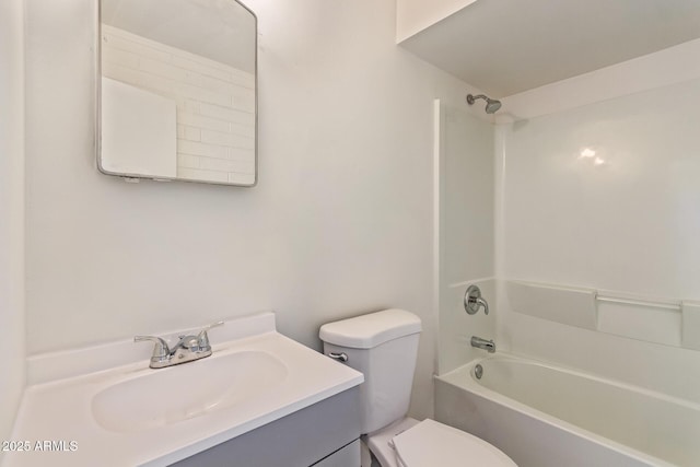 full bathroom with toilet, vanity, and shower / bathing tub combination