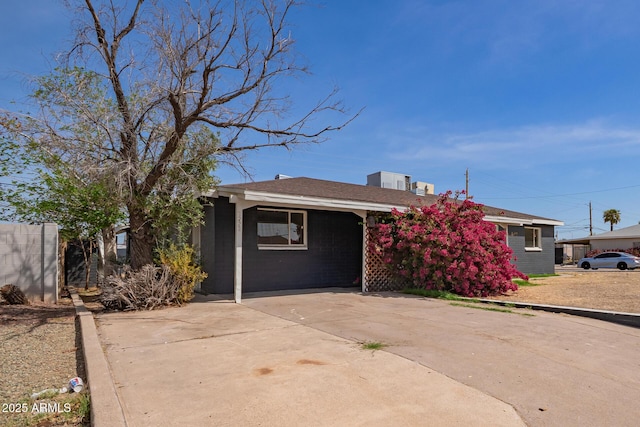 view of front of home with concrete driveway