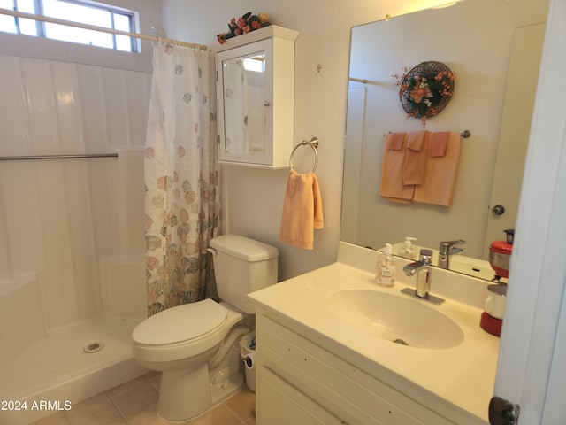 bathroom with tile patterned flooring, vanity, toilet, and a shower with shower curtain