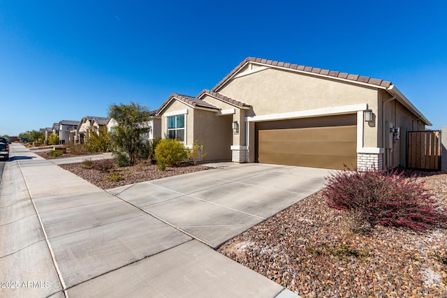 8222 W Clemente Way, Florence, AZ 85132 - single story home featuring an attached garage, stucco siding, and driveway