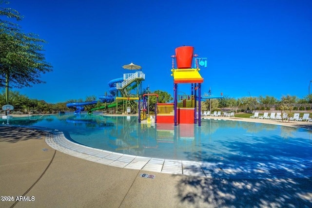 8222 W Clemente Way, Florence, AZ 85132 - community pool with a water play area and a water slide