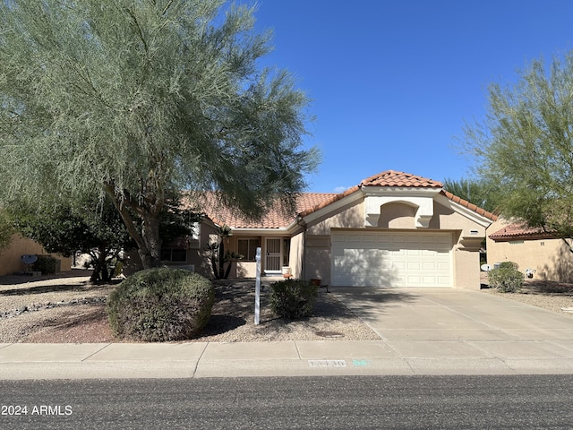 view of front of property featuring a garage