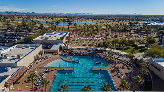 aerial view featuring a water and mountain view