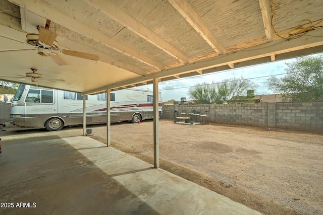 view of patio / terrace featuring a ceiling fan and fence