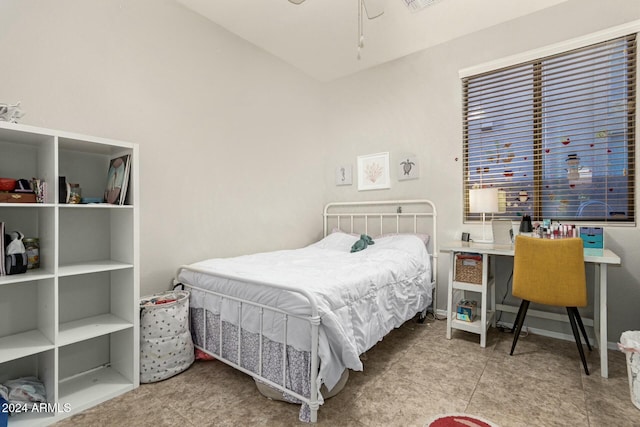 bedroom with light tile patterned floors