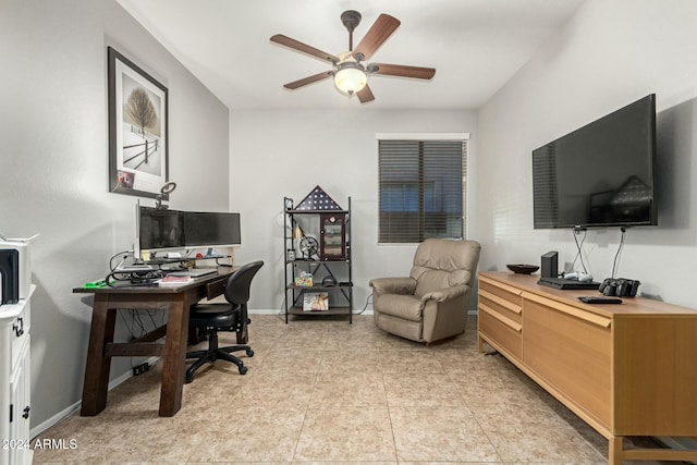 tiled office featuring ceiling fan