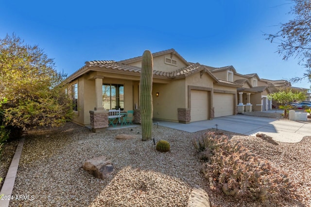 view of front of property featuring a garage