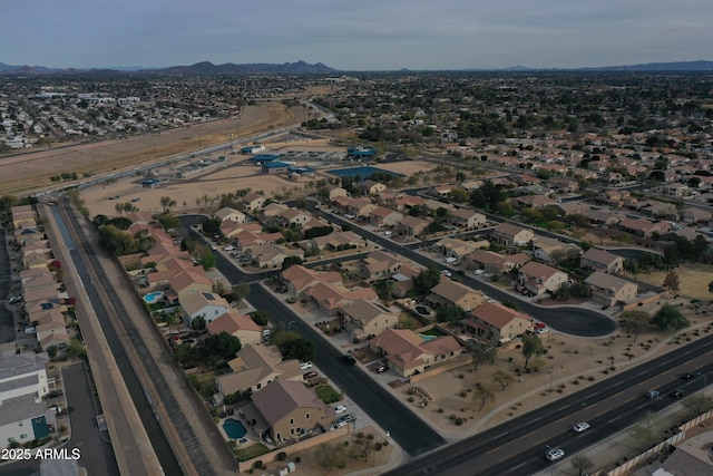 bird's eye view with a mountain view and a residential view