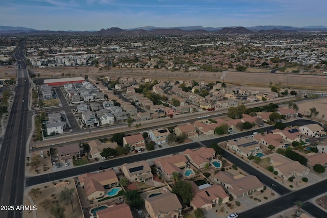 bird's eye view featuring a mountain view and a residential view