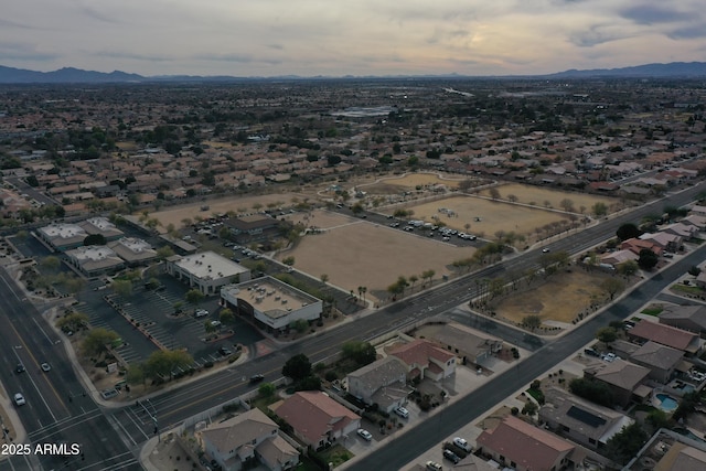 aerial view at dusk with a mountain view
