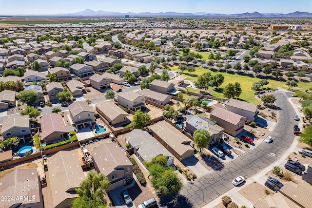 birds eye view of property featuring a mountain view