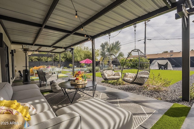 view of patio / terrace featuring outdoor dining space, outdoor lounge area, and a fenced backyard