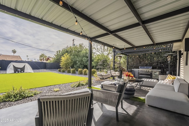 view of patio / terrace with an outdoor hangout area, area for grilling, and a fenced backyard