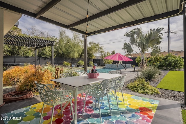 view of patio / terrace featuring outdoor dining area and fence