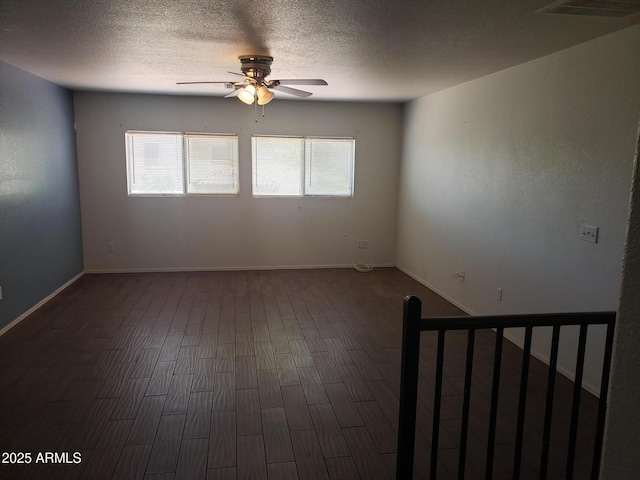 unfurnished room featuring ceiling fan and wood-type flooring