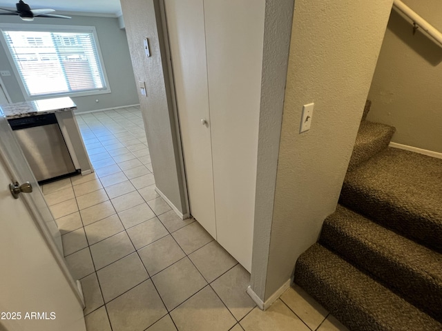 2301 E University Dr Unit 269, Mesa, AZ 85213 - stairs with tile patterned flooring, a ceiling fan, and a textured wall