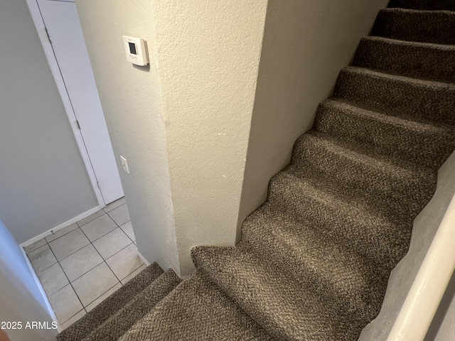 2301 E University Dr Unit 269, Mesa, AZ 85213 - stairway with tile patterned floors and a textured wall