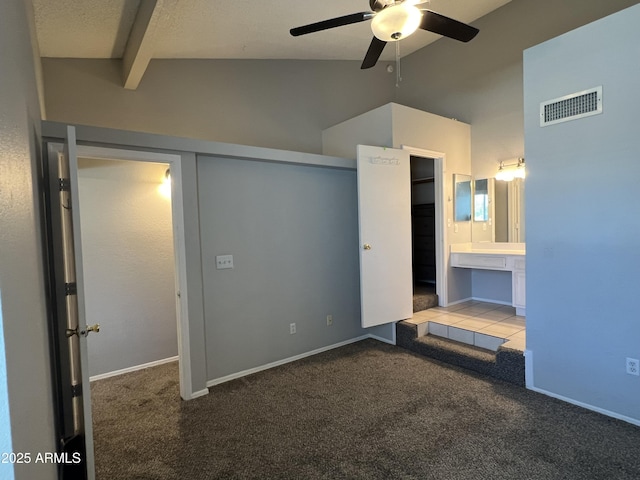 2301 E University Dr Unit 269, Mesa, AZ 85213 - unfurnished bedroom with carpet flooring, beamed ceiling, ensuite bath, high vaulted ceiling, and ceiling fan