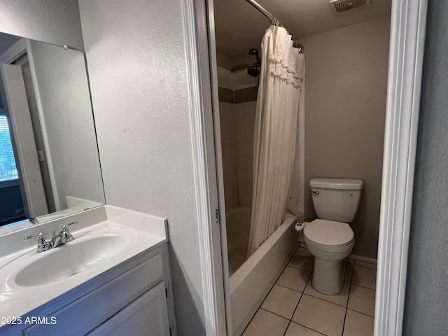 2301 E University Dr Unit 269, Mesa, AZ 85213 - full bath featuring tile patterned flooring, vanity, shower / bath combo with shower curtain, and a textured wall