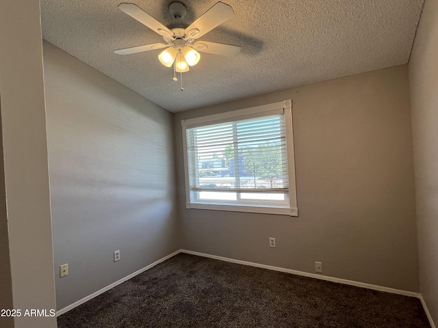 2301 E University Dr Unit 269, Mesa, AZ 85213 - unfurnished room featuring a textured ceiling, dark carpet, and a ceiling fan