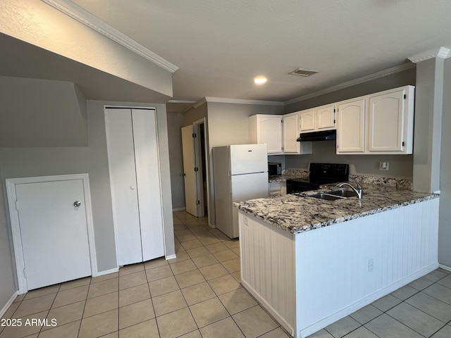 2301 E University Dr Unit 269, Mesa, AZ 85213 - kitchen with freestanding refrigerator, under cabinet range hood, light stone counters, a peninsula, and crown molding