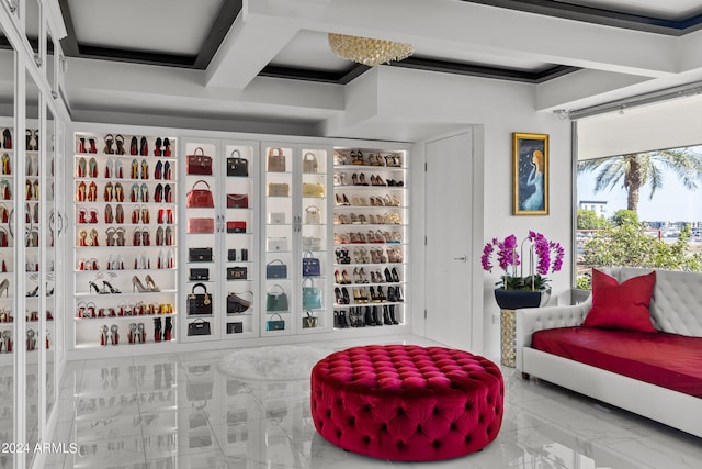 wine room featuring coffered ceiling, beam ceiling, and light tile flooring