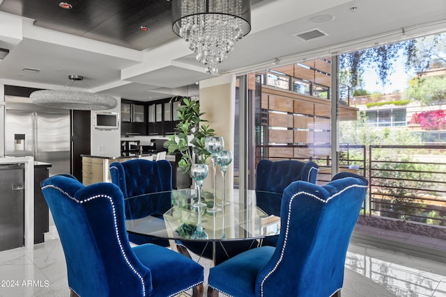 tiled dining area with a notable chandelier