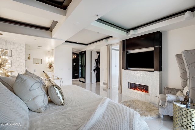 tiled bedroom with a tray ceiling