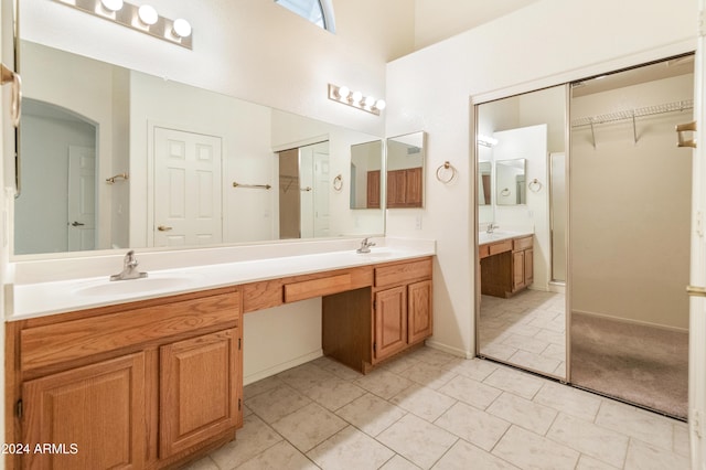 14543 W Bison Path, Surprise, AZ 85374 - bathroom with double vanity and a walk in closet