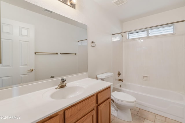 full bathroom with tile patterned floors, vanity, shower / bath combination, and toilet