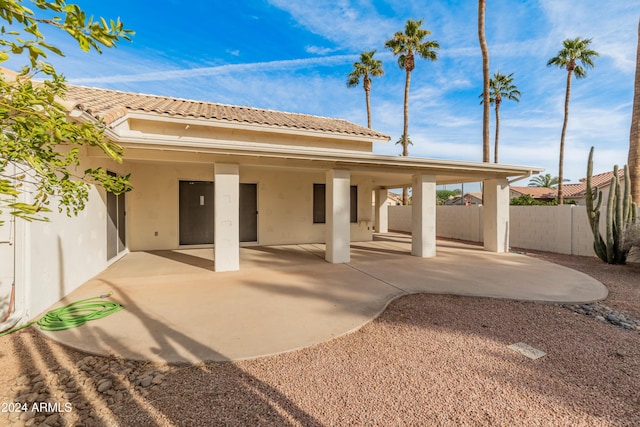 14543 W Bison Path, Surprise, AZ 85374 - back of house with stucco siding, a patio, and a tiled roof