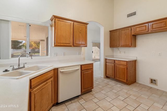 kitchen featuring dishwasher and sink