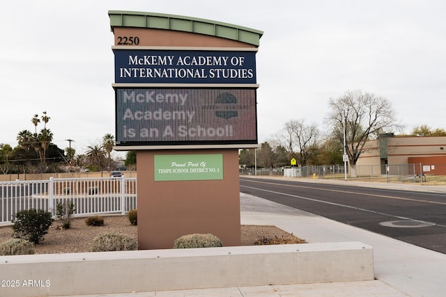 exterior details featuring fence