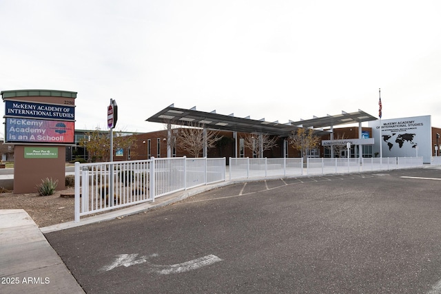 view of front of house featuring fence