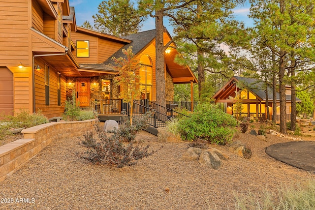 7500 E Old Walnut Canyon Rd, Flagstaff, AZ 86004 - exterior space featuring covered porch and roof with shingles