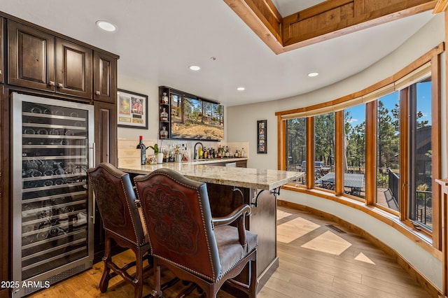 7500 E Old Walnut Canyon Rd, Flagstaff, AZ 86004 - bar featuring wet bar, beverage cooler, light wood-style flooring, baseboards, and recessed lighting