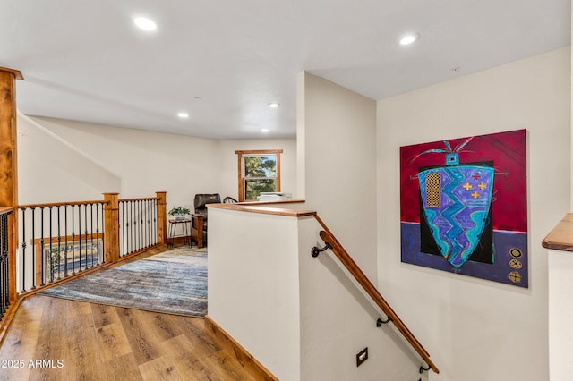 7500 E Old Walnut Canyon Rd, Flagstaff, AZ 86004 - hallway with wood finished floors, an upstairs landing, and recessed lighting