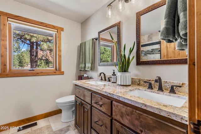 7500 E Old Walnut Canyon Rd, Flagstaff, AZ 86004 - full bath with toilet, a sink, and a wealth of natural light
