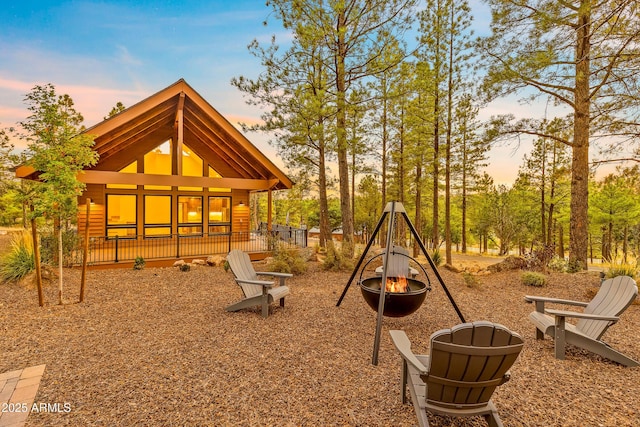 7500 E Old Walnut Canyon Rd, Flagstaff, AZ 86004 - playground at dusk with a fire pit