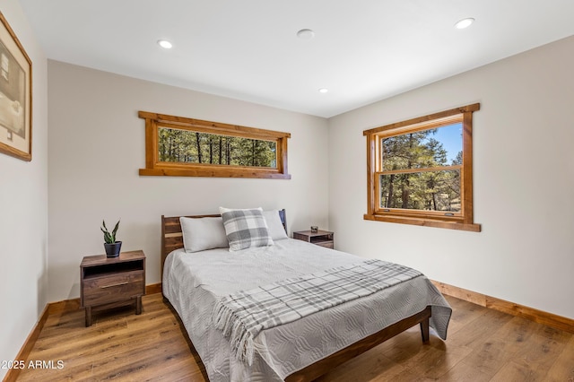 7500 E Old Walnut Canyon Rd, Flagstaff, AZ 86004 - bedroom with baseboards, recessed lighting, and light wood finished floors