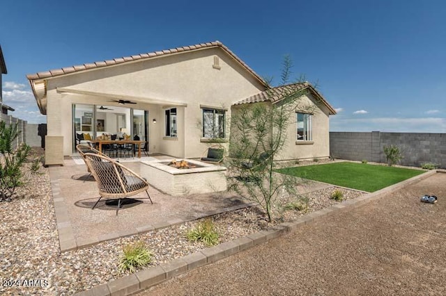 26966 N 168th Ln, Surprise, AZ 85387 - rear view of house with an outdoor fire pit, a patio area, stucco siding, and ceiling fan