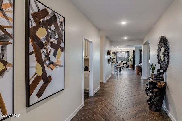 hall with dark parquet floors