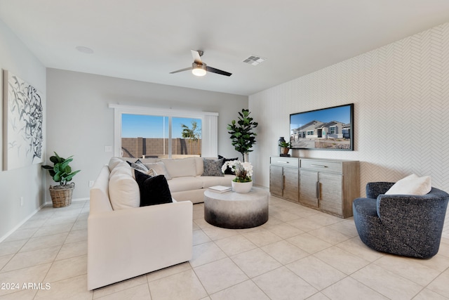 living room with light tile patterned floors and ceiling fan